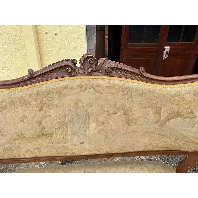 Crafted with meticulous attention to detail, this Antique French Walnut Love Seat embodies the elegance of the Louis XV...