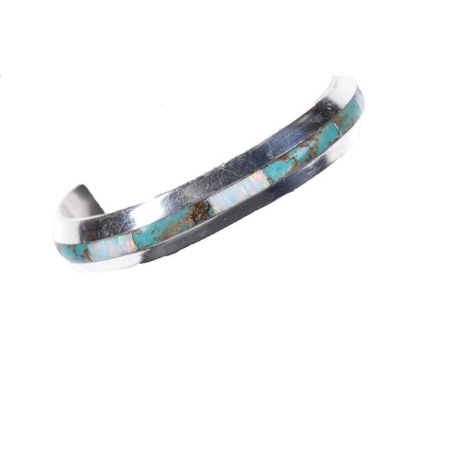 Vintage Native American Turquoise/opal channel inlay bracelet. 7" including the 1.5" gap. 37.7 grams marked and tested...