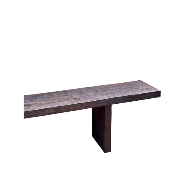 A sculptural hand-carved teak wood bench, a wonderful addition to bring warmth any space. The table is hand-carved by...