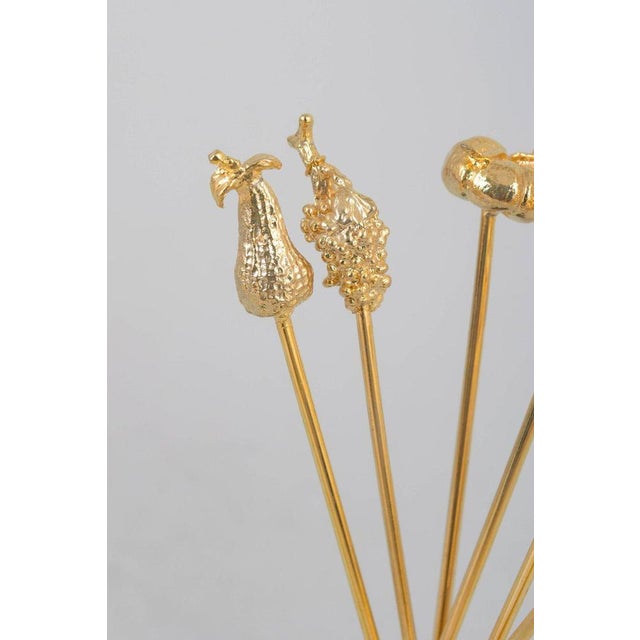 Skultuna, set of six cocktail sticks with fruit and vegetable motifs. Decorative metal cocktail sticks with detailed...