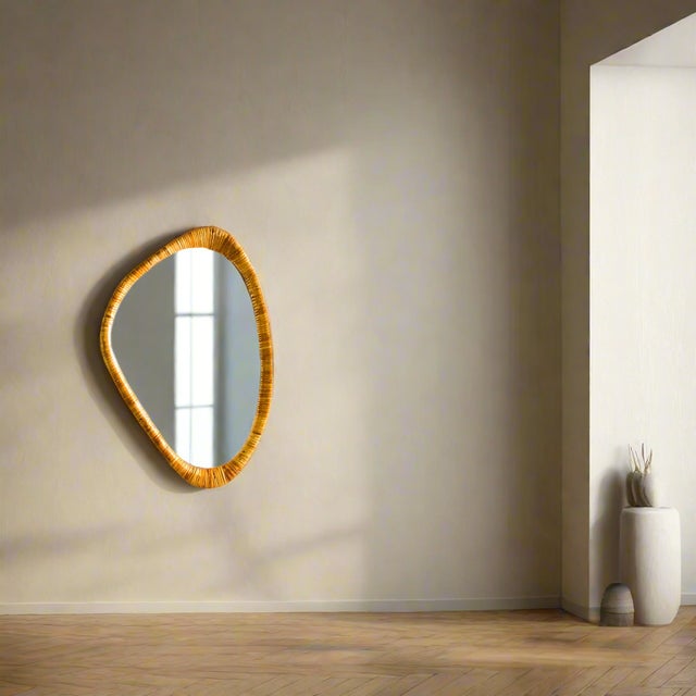 This lovely midcentury wall mirror is made of organic rattan cane materials and streamlined aesthetics. The use of rattan,...