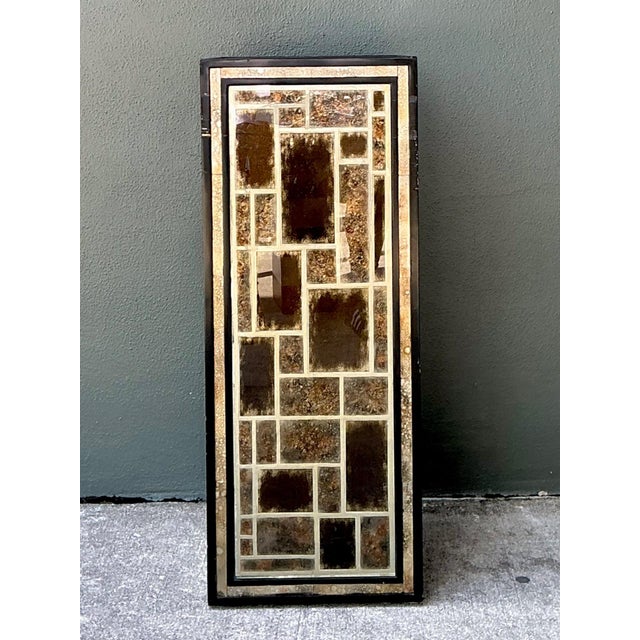 This vintage églomisé geometric glass pedestal is a striking example of refined decorative craftsmanship, blending...