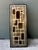 This vintage églomisé geometric glass pedestal is a striking example of refined decorative craftsmanship, blending...