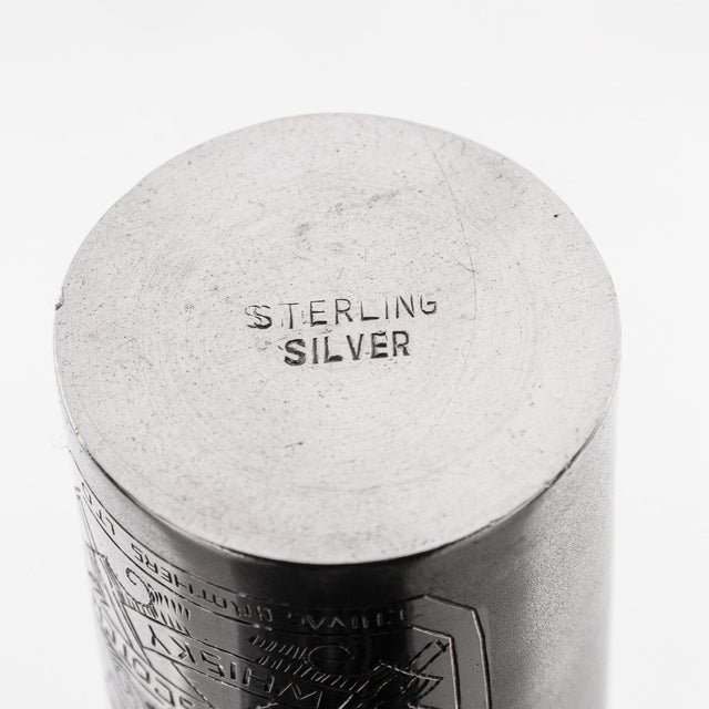 A novelty solid silver chivas regal whisky bottle. Of a miniature size however heavy gauge throughout. A cylindrical form...