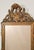 A Louis XVI–style painted & gilt mirror, France circa 1920.