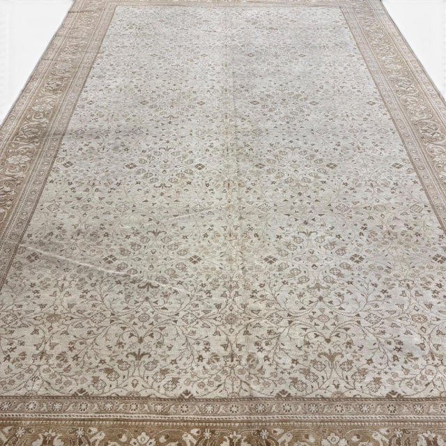 This vintage Sivas rug from Turkey embodies quiet sophistication through its finely detailed allover floral design and...