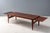 Denmark, ca. 1960s. An elegant yet substantial rosewood coffee table by Johannes Andersen. Features rosewood construction...