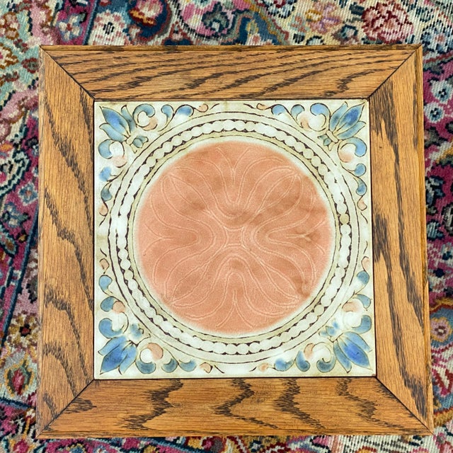 A unique vintage tabletop wine rack for six standard wine bottles featuring a solid oak frame with pegged construction and...