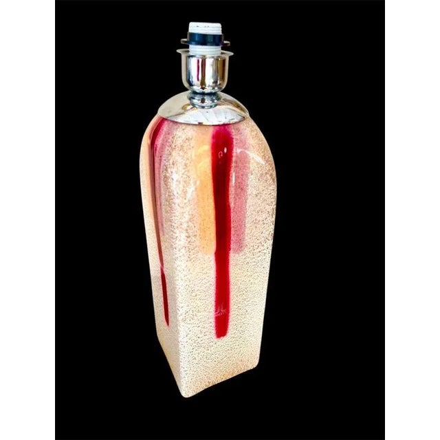 A Lancetti Milano table lamp in Murano glass appears to combine the high fashion influence of Lancetti Milano (a noted...