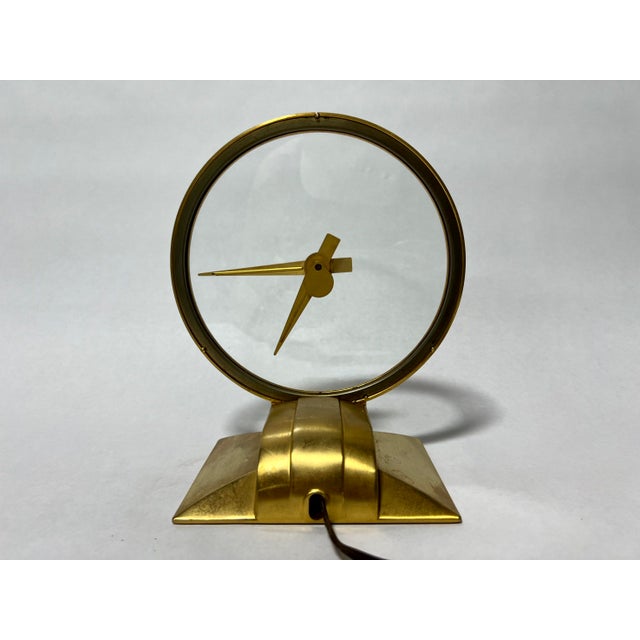 Jefferson Golden Hour clock, an icon of mid-century modern design. This "mystery clock" has Uranium painted floating hands...