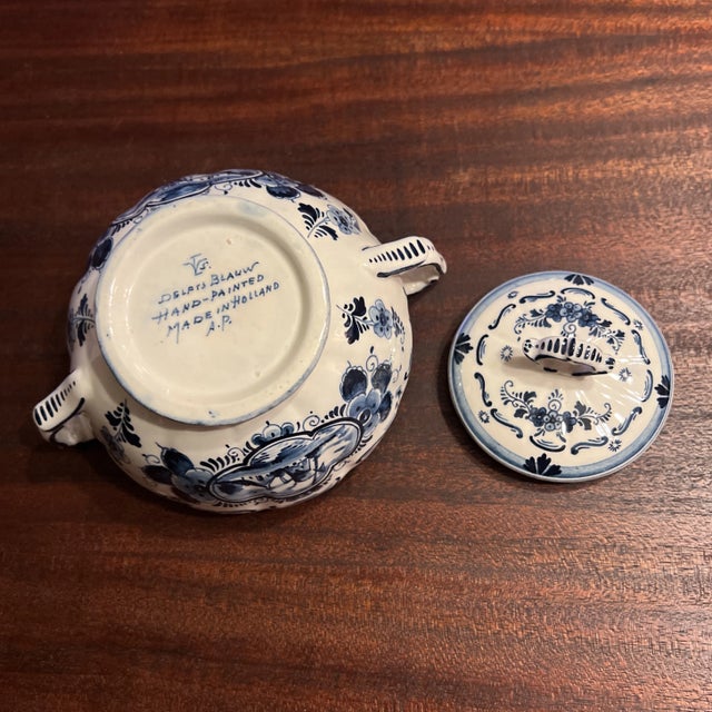 Hand Painted Delft Blue Large Covered Sugar Bowl Features: - made in Holland - signed as pictured on base - beautifully...