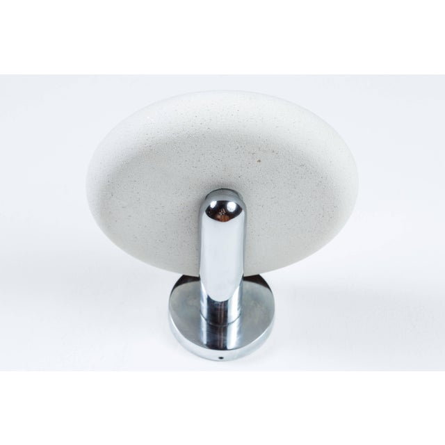 Stone and chrome wall sconces by Charles Pfister for Boyd Lighting; eight pair available.