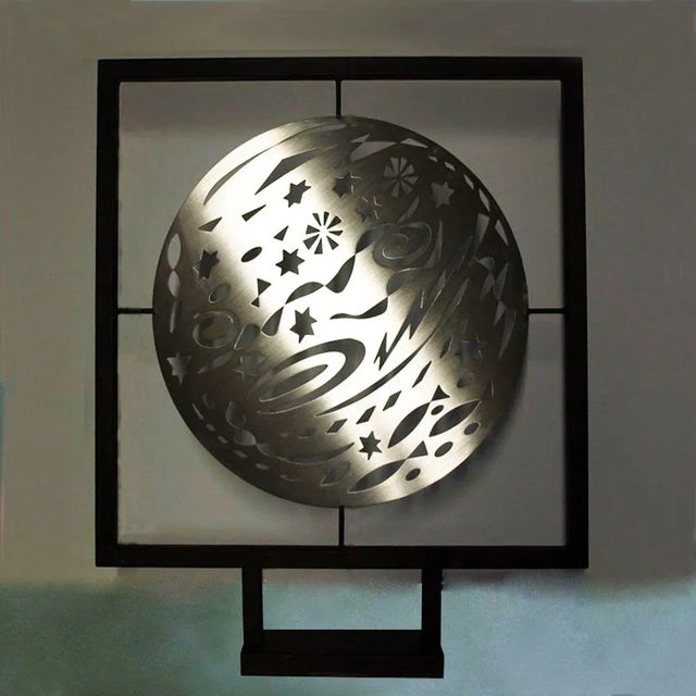 Angelo Rinaldi, "La notte di S. Lorenzo", laser-cut and satin-finished steel sculpture by hand, inserted in a patinated...