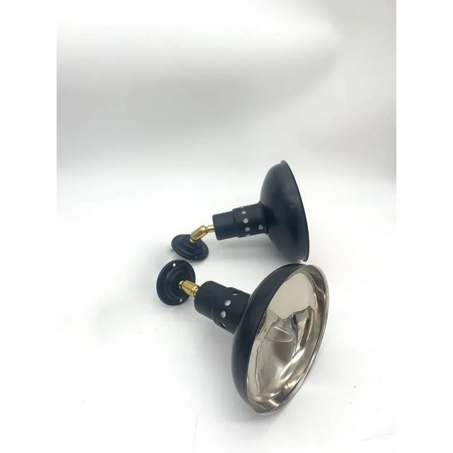 Fantastic pair of wall lights or spotlights. Externally they are opaque black and internally they are chromed \.\. They...