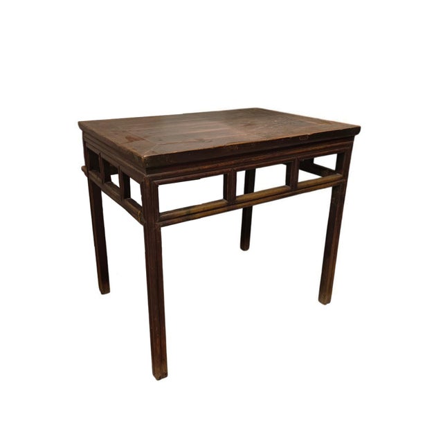 This antique 19th-century table is a traditional open-frame accent piece made from solid elm wood. Built using traditional...