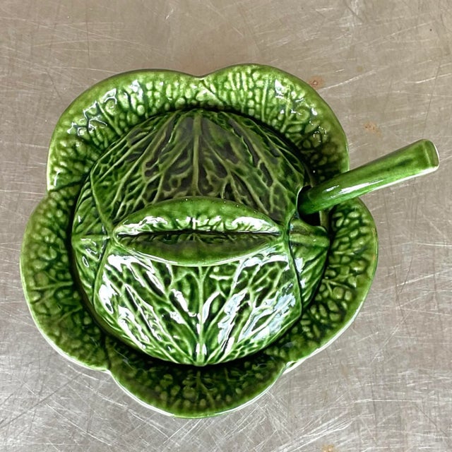 Elevate your dining table with this Vintage Regency Portuguese cabbage leaf tureen. Its detailed craftsmanship and lush...