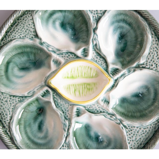 A lovely antique French majolica trompe l'oeil oyster plate made at the famous St. Clement faience factory in the East of...