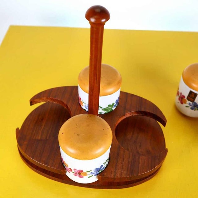 This elegant set of ceramic jars is a distinctive piece of 1960s italian design, created by renowned artist franco pozzi....