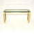 A stylish and very well made vintage Italian brass and glass console side table, dating from the 1970’s. It has a...