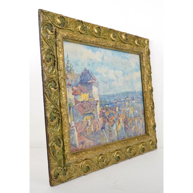 This reproduction artwork is a famous landscape print titled "Praha" (Prague) or "Léto v Praze" (Summer in Prague). It was...