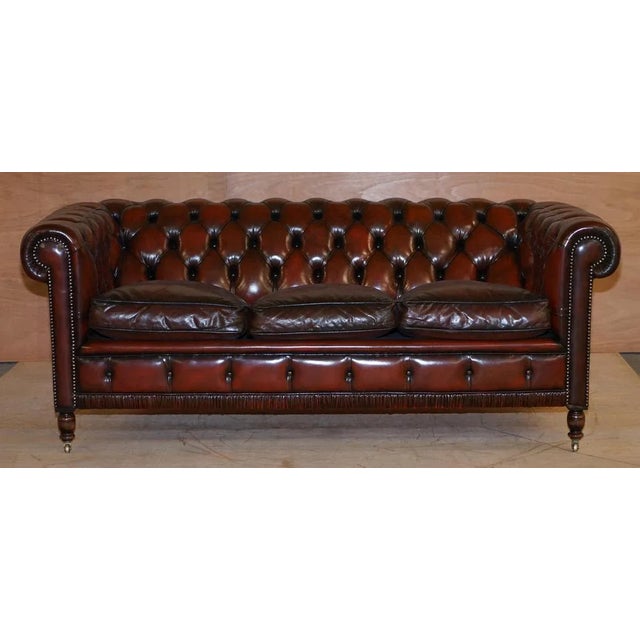 Stunning very rare Handmade in England fully restored Bordeaux leather Gentleman's club sofa Where to begin! This sofa is...