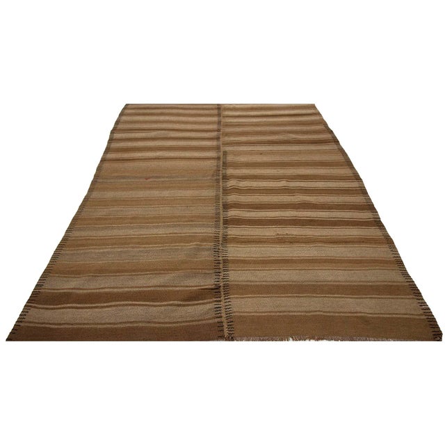 Handwoven vintage natural kilim rug from Kars region of Turkey. Approximately 50-60 years old. In very good condition