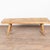 The appeal of this rustic coffee table comes from the thick wood of the top that originally served as a worktable. The...