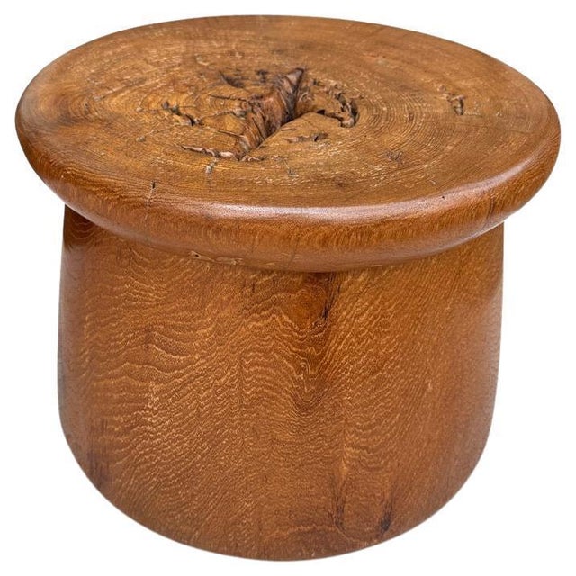 Antique mortar originally used to grind rice. We turned it upside down and smoothed out the entire piece revealing the...