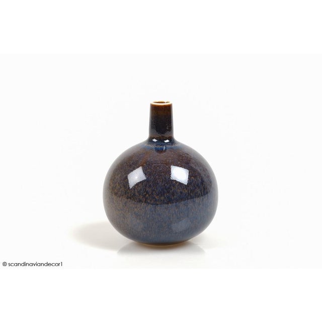 Handmade Scandinavian Modern ceramic vase by Carl-Harry Stålhane for Rörstrand, 1950s. Modern and timeless sphere-shaped...