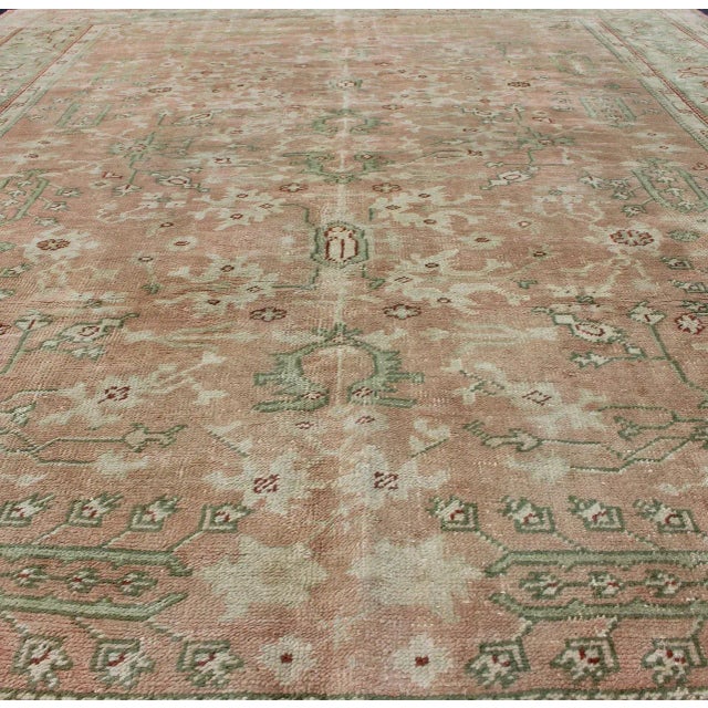 Early 20th Century Classic All Over Design Antique Oushak Rug in Light Coral and Light Green For Sale - Image 5 of 12