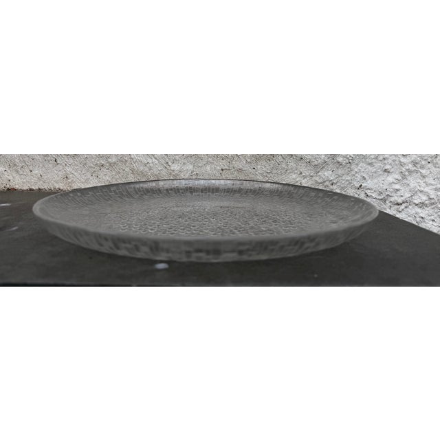 Round texture glass serving platter design by Tapio Wirkkala for iittala. The platter is not marked.