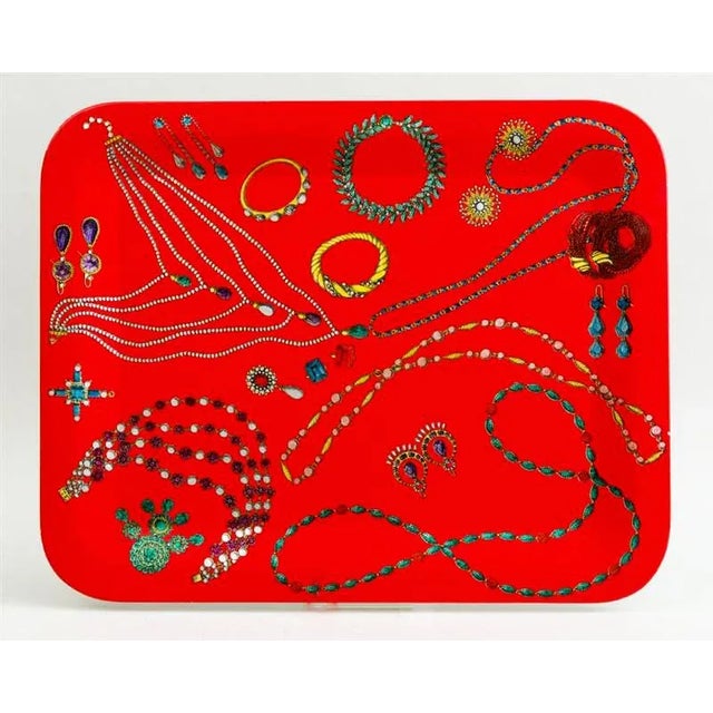 Scarlet Treasure: Fornasetti's Collane Jewelry Tray (c. 1980s–1990s) This is a very striking large metal tray from Atelier...