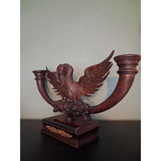 This black forest style sculpture is made on Germany and represent a Swan opwn arms and candle holder ,each side holds 3...
