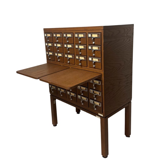 Vintage Worden library card catalog cabinet from Holland, Michigan retaining original manufacturer labels. Beautiful oak...
