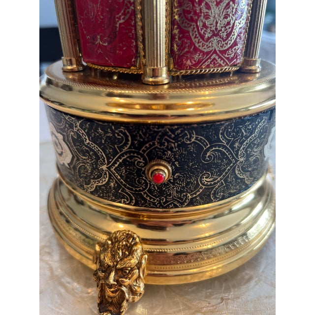 This exquiste Vintage Reuge Leather Embossed Lipstick/Cigarette Holder Carousel Music Box. Circa 1940-1959 is a must have...