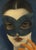 "Veiled Gaze" presents an evocative 9x12 inch giclée art print, depicting a mysterious woman in a masquerade mask. The...