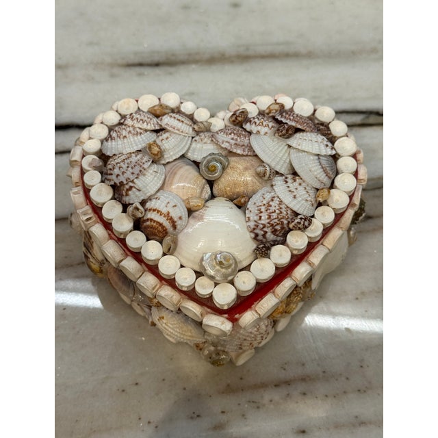 Vintage heart shaped shell covered trinket box.