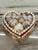 Vintage heart shaped shell covered trinket box.