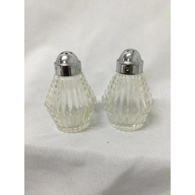 Vintage Mid Century Modern Glass Salt and Pepper Shakers. Each Measures 3" X 1 1/2" X 1 1/2"