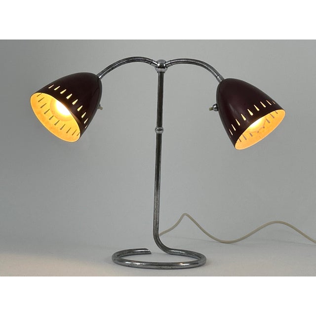 Rare, elegant and large mid-century modern double head table lamp or desk light with goose neck arms and perforated lamp...