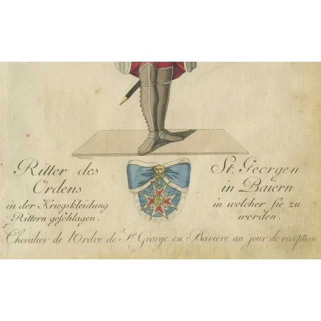 Knight of the Order of St. George in Bavaria: 1791 Hand-Colored Engraving This finely detailed hand-colored engraving,...