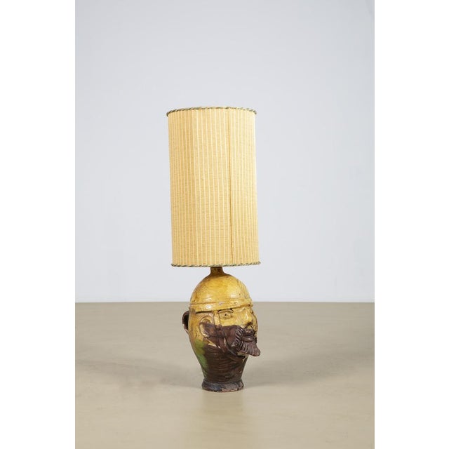 A rare and captivating table lamp handcrafted in Seminara, the historic heart of Calabrian ceramic tradition. The base is...