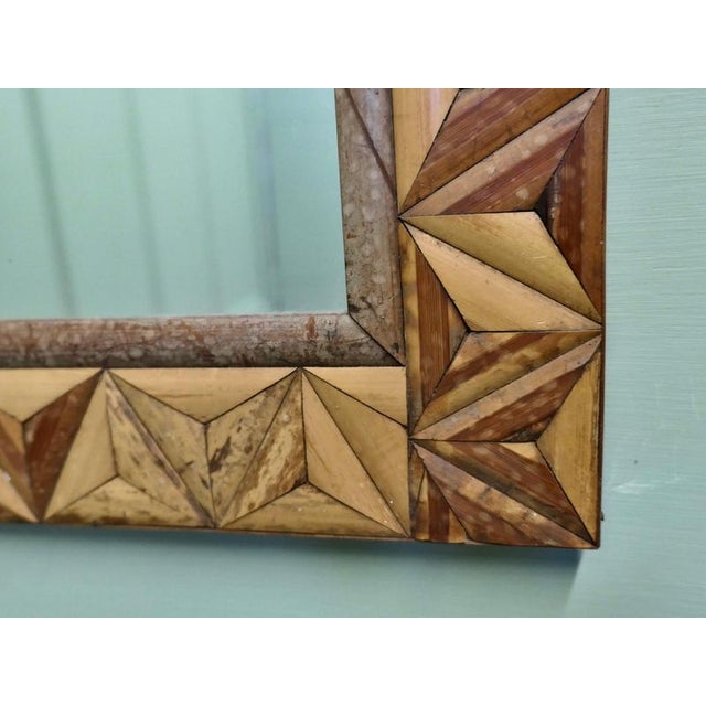 A Pair of Art Deco Bamboo Inlaid Mirrors This is a very unusual pair, the mirror frames are inlaid with decorative...