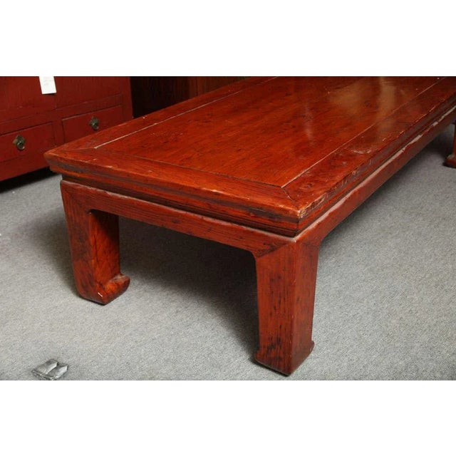 Wood Antique Chinese Red Lacquered Elmwood Bed / Coffee Table From the 19th Century For Sale - Image 7 of 9