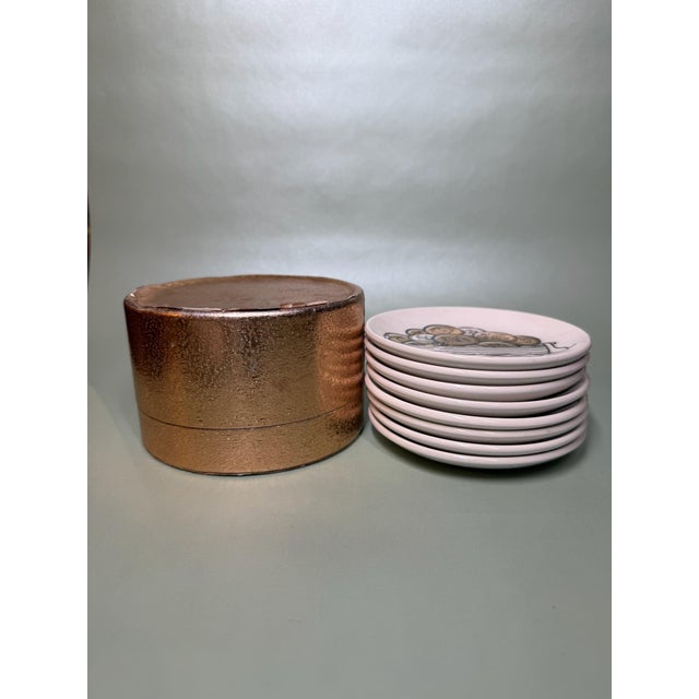 This is a rare set of porcelain coasters designed by Piero Fornasetti and produced in the 1970s, expressly commissioned by...