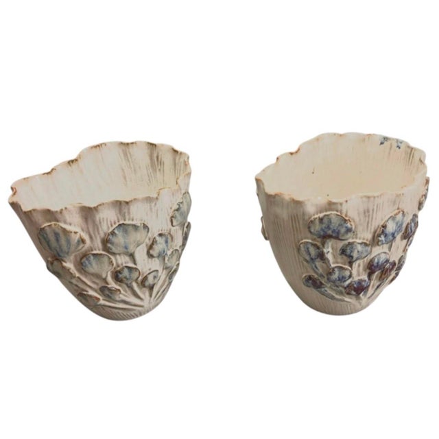 Introduce a touch of organic elegance to your home decor with this charming pair of small vintage ceramic vases, artisan-...