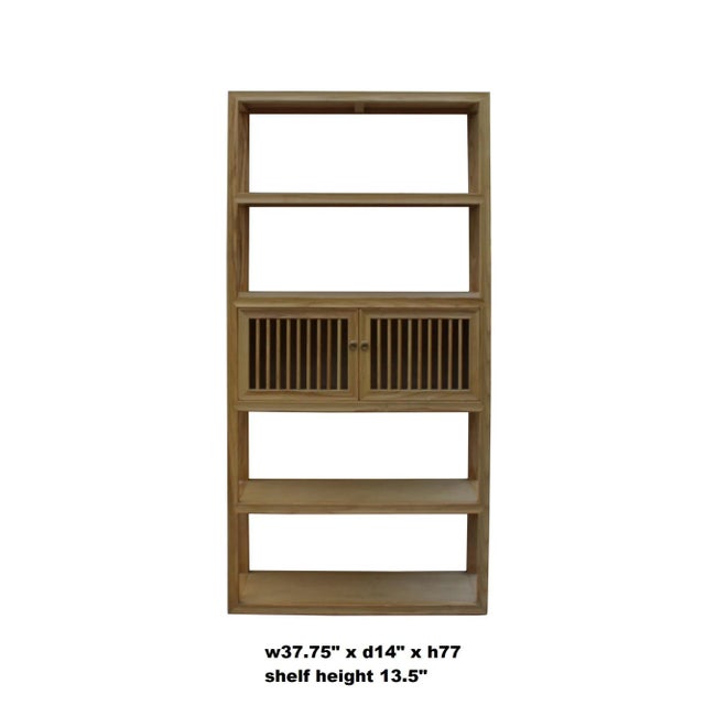 This is a simple design bookcase divider cabinet using natural raw wood. It has a closed shutter doors storage at the...