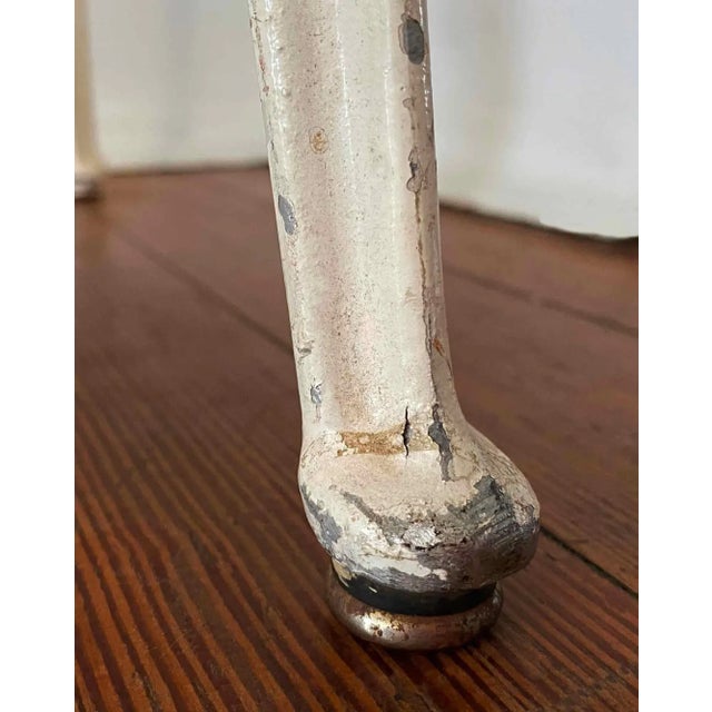 Mid century modern 1946 cast aluminum "Ba3" Chair by Ernest Race for Race Furniture with distressed rose velvet upholstery.