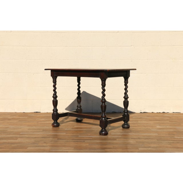 A beautiful Antique English Solid Oak Barley Twist Table, crafted in England during the 1920s. Rich in character and...