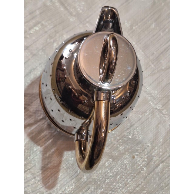Vintage style to your tabletop with this polished chrome insulated coffee and tea server, featuring a distinctive raised...